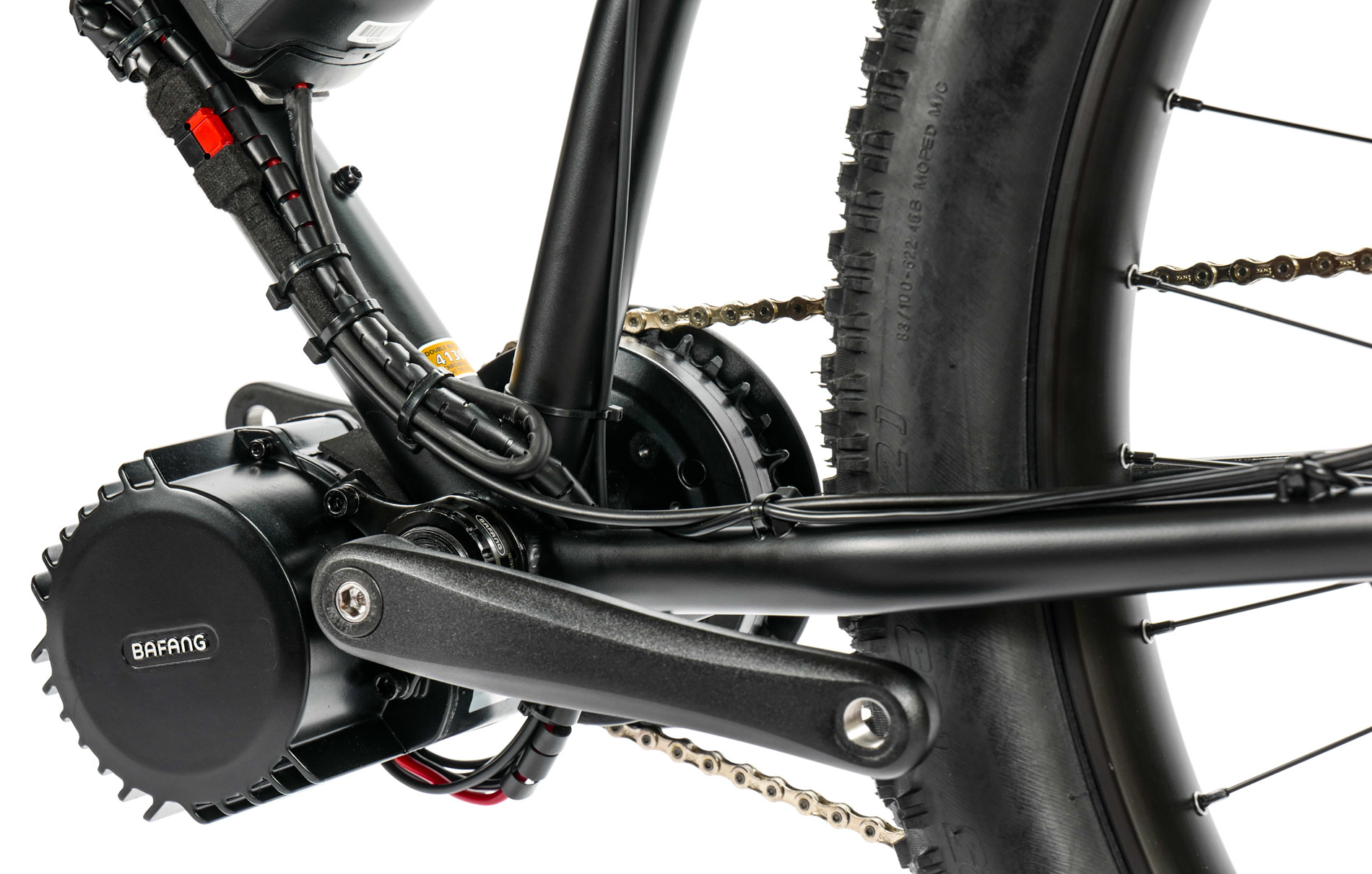 Mid drive produced by Bafang mounted on the bottom bracket of the frame, driving the chain